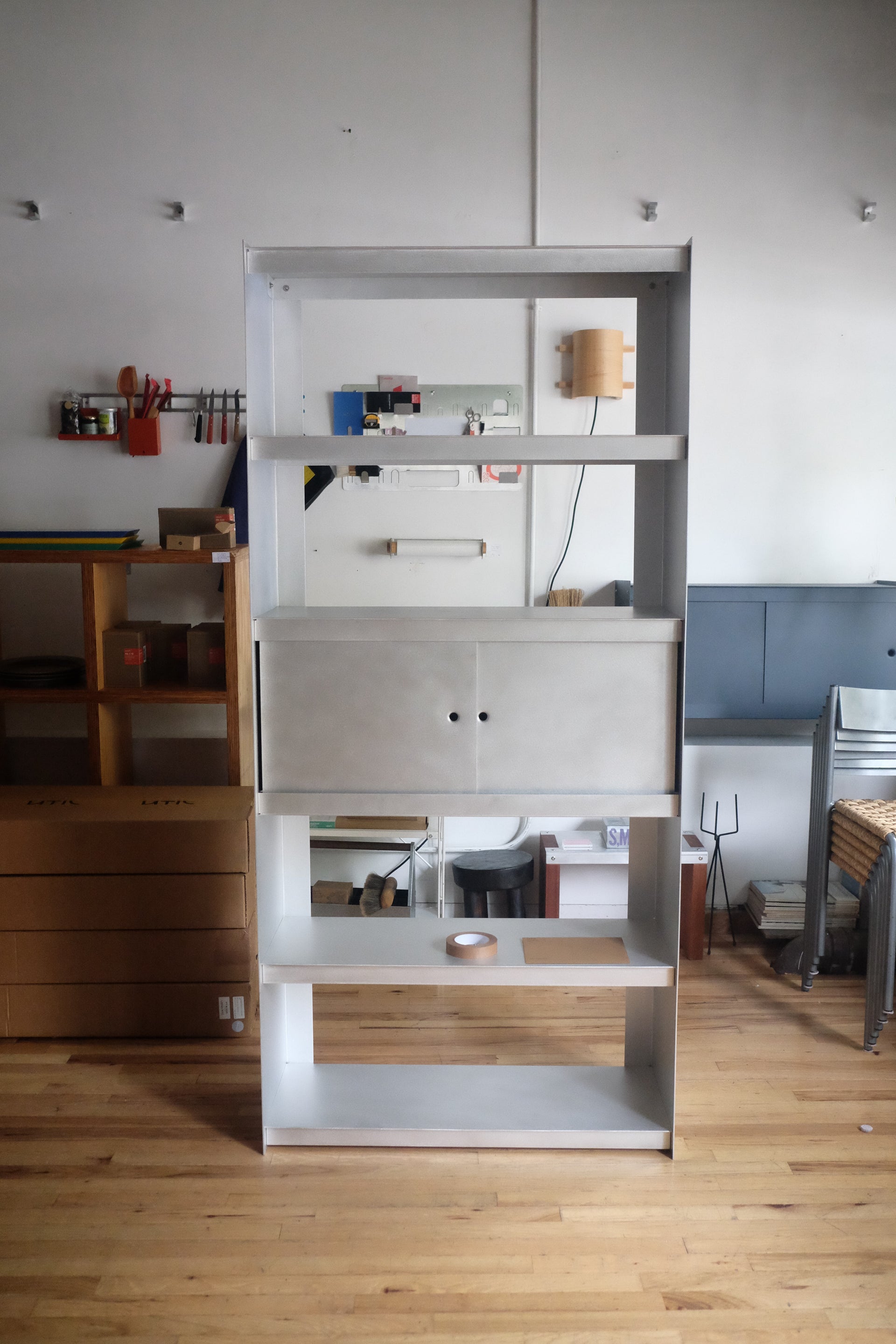 Plié Bookshelf with Siding Doors in Brushed Aluminum