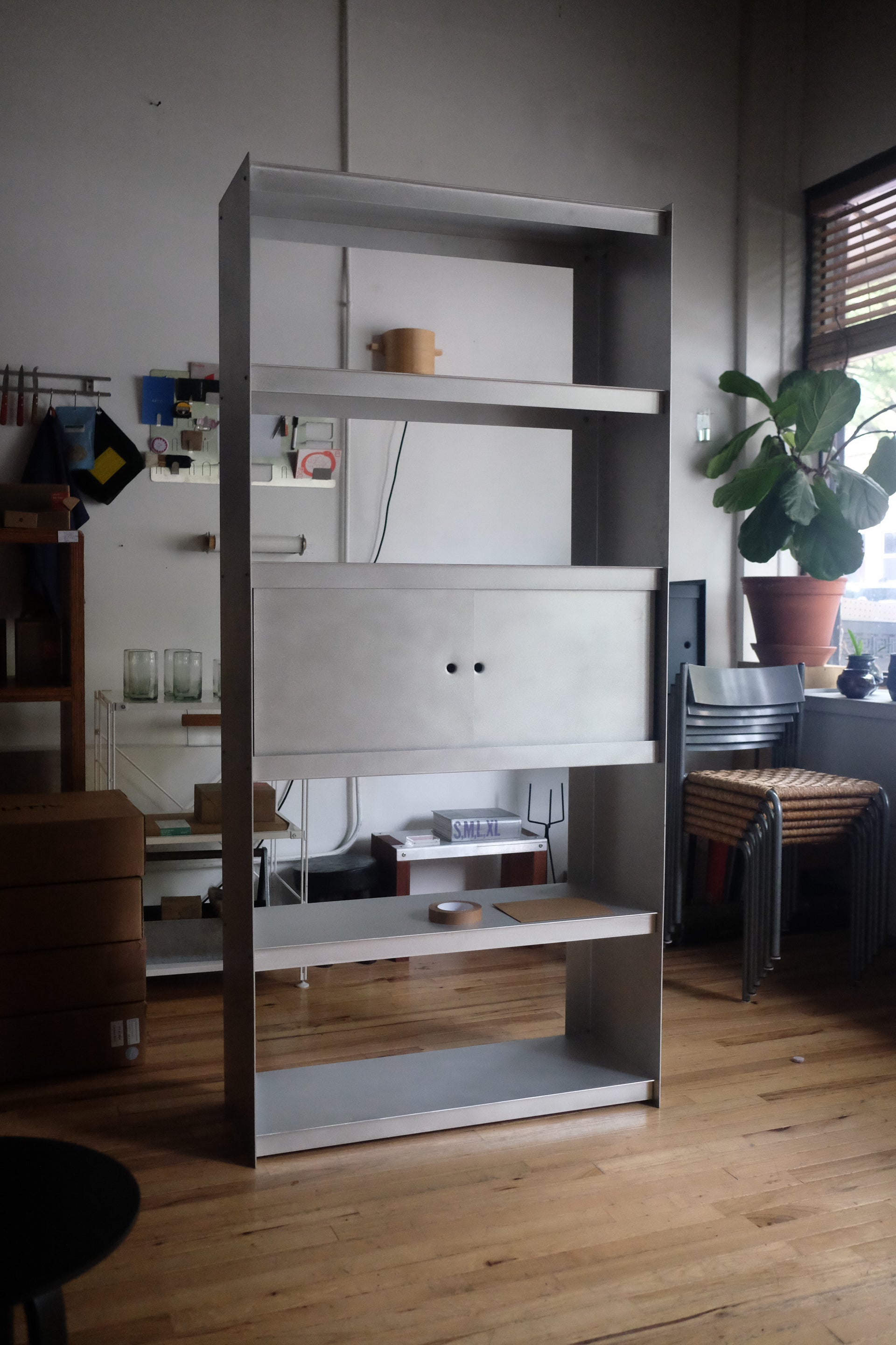 Plié Bookshelf with Siding Doors in Brushed Aluminum