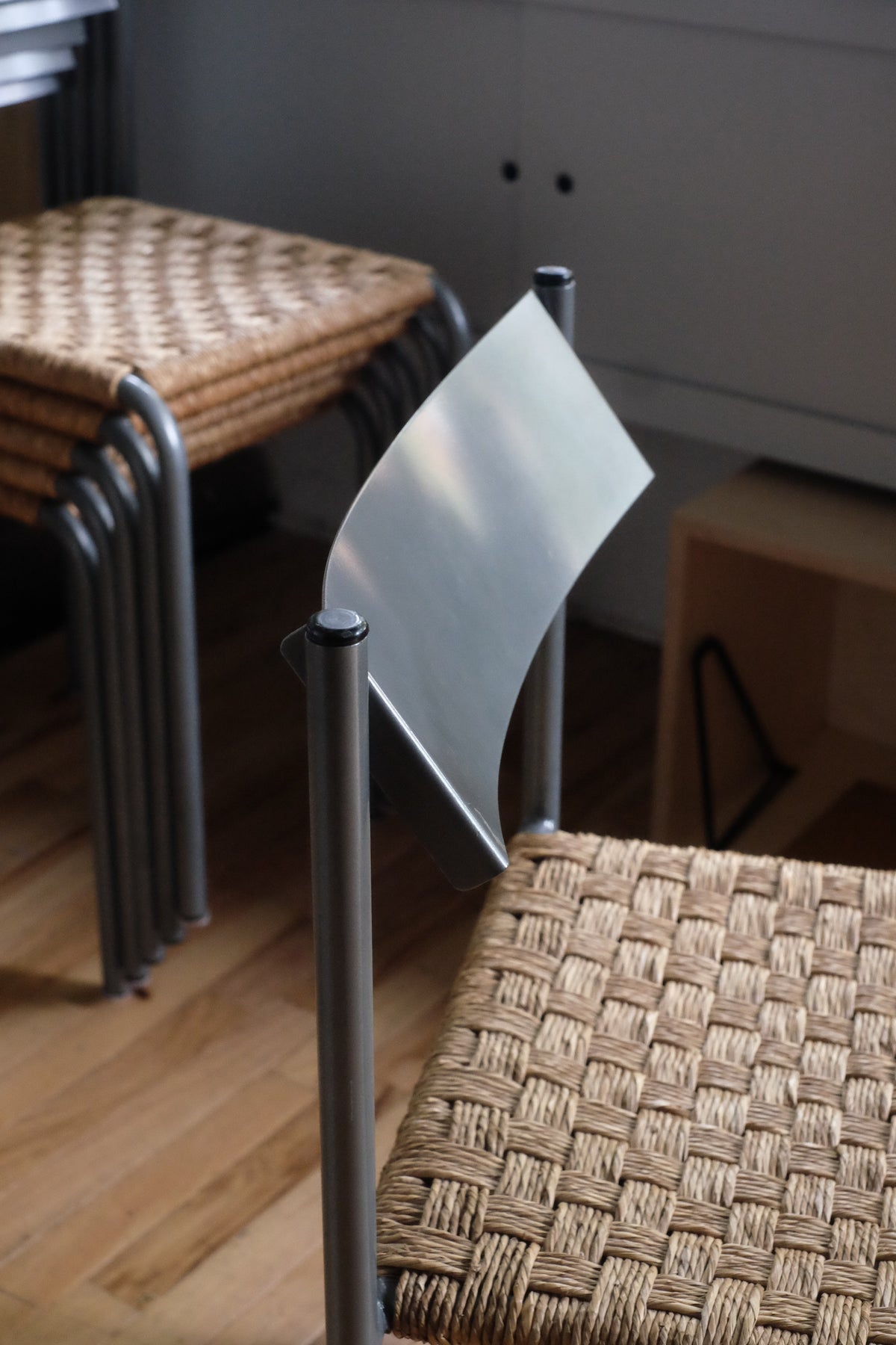 Steel and Rattan Stacking Dining Chairs (Set of 4) - lichennyc