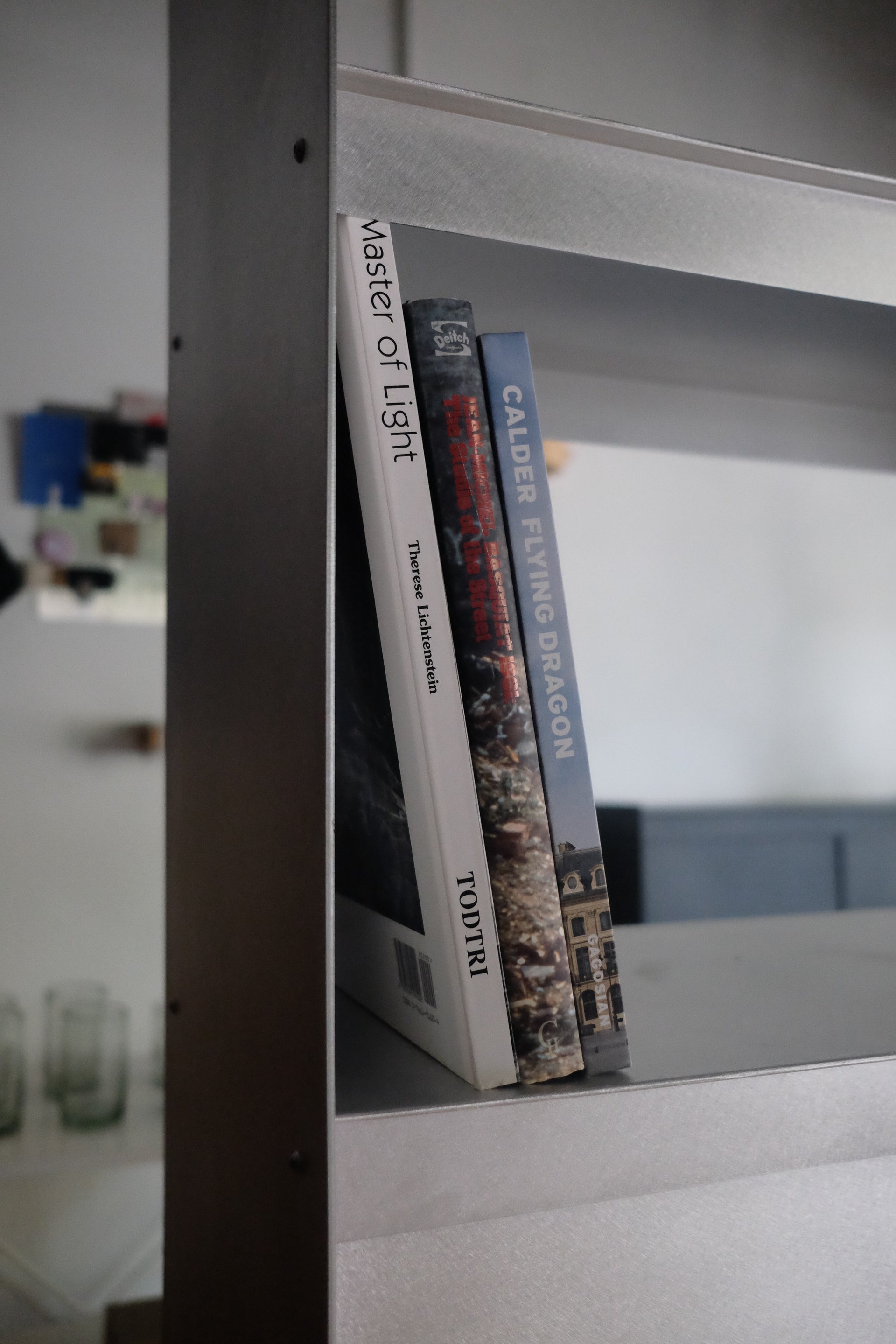 Plié Bookshelf with Siding Doors in Brushed Aluminum